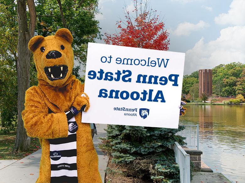 The Nittany Lion mascot holding up a sign reading Welcome to <a href='http://t67yubk.lcxjj.net'>十大网投平台信誉排行榜</a>阿尔图纳分校
